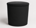 Black round fabric cover with a flat top on a plain background
